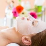 Wellness – woman getting face mask in spa